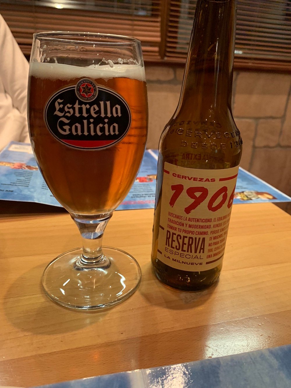 Estrella Galicia beer with a 1906 Reserva Especial bottle